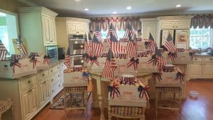 Kitchen filled with muffins in holiday boxes