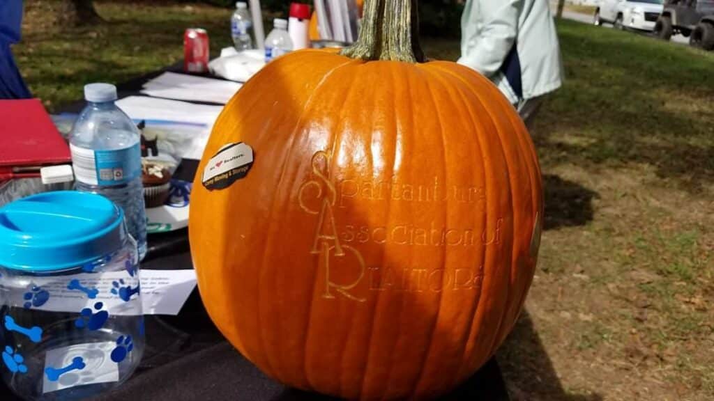 Pumpkin with Spartanburg Association of Realtors carved into it